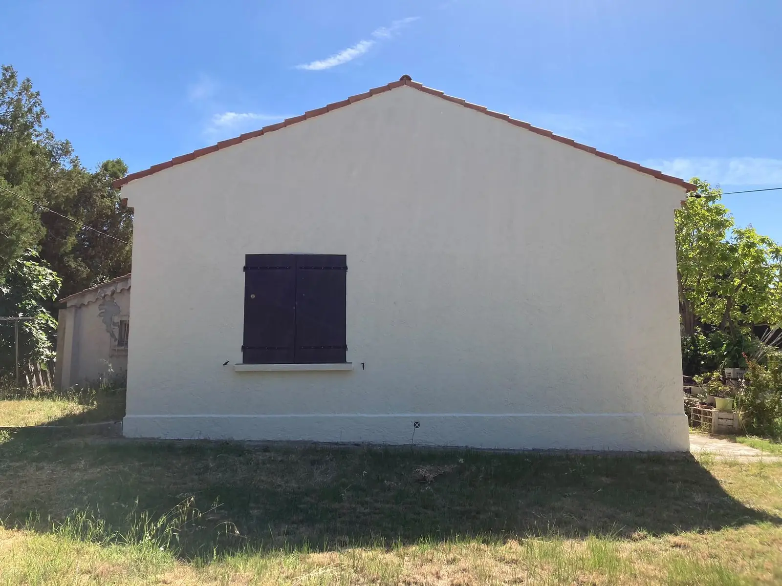 Pignon après ravalement, enduit neuf